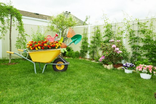 Hernehill landscaping with seasonal planting and structured borders